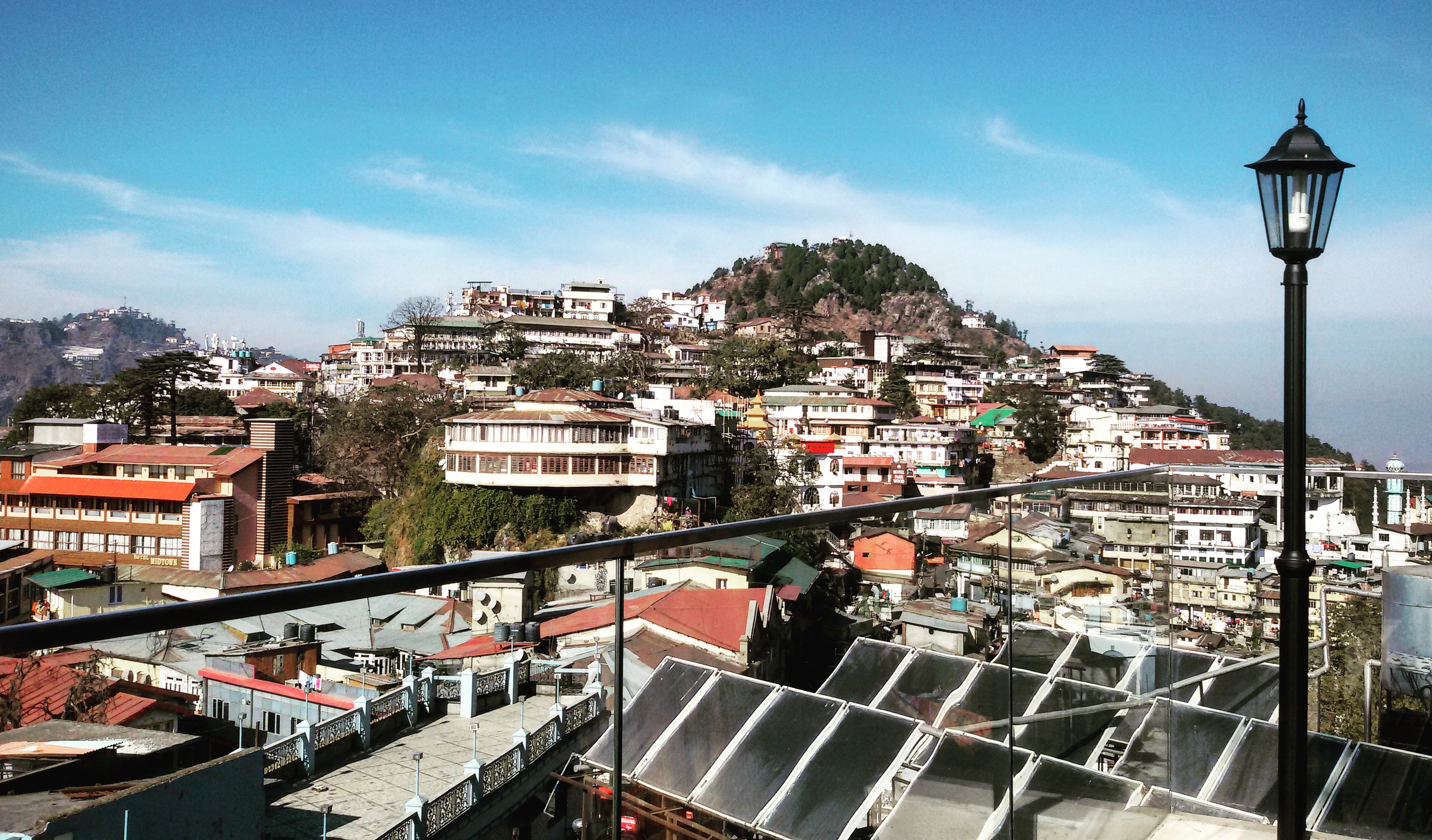 View of Mussoorie from the reception area of Mosaic Hotel 